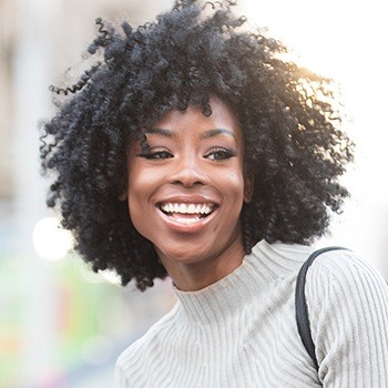 Woman with gorgeous smile outdoors