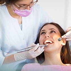 Woman receiving dental treatment