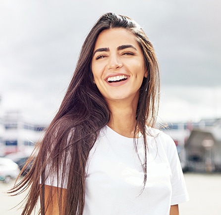 Woman with gorgeous smile outdoors