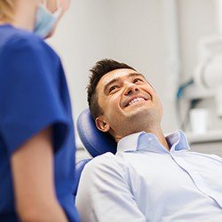 Smiling man in dental chair