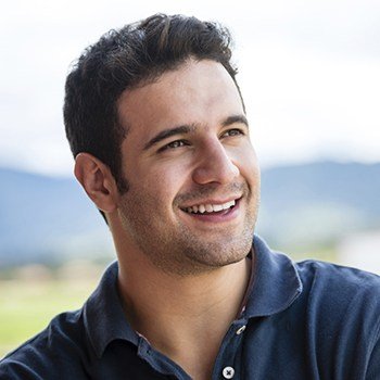 Man with healthy smile outdoors