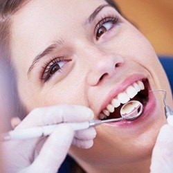 Woman receiving dental checkups