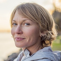 Smiling older woman outdoors